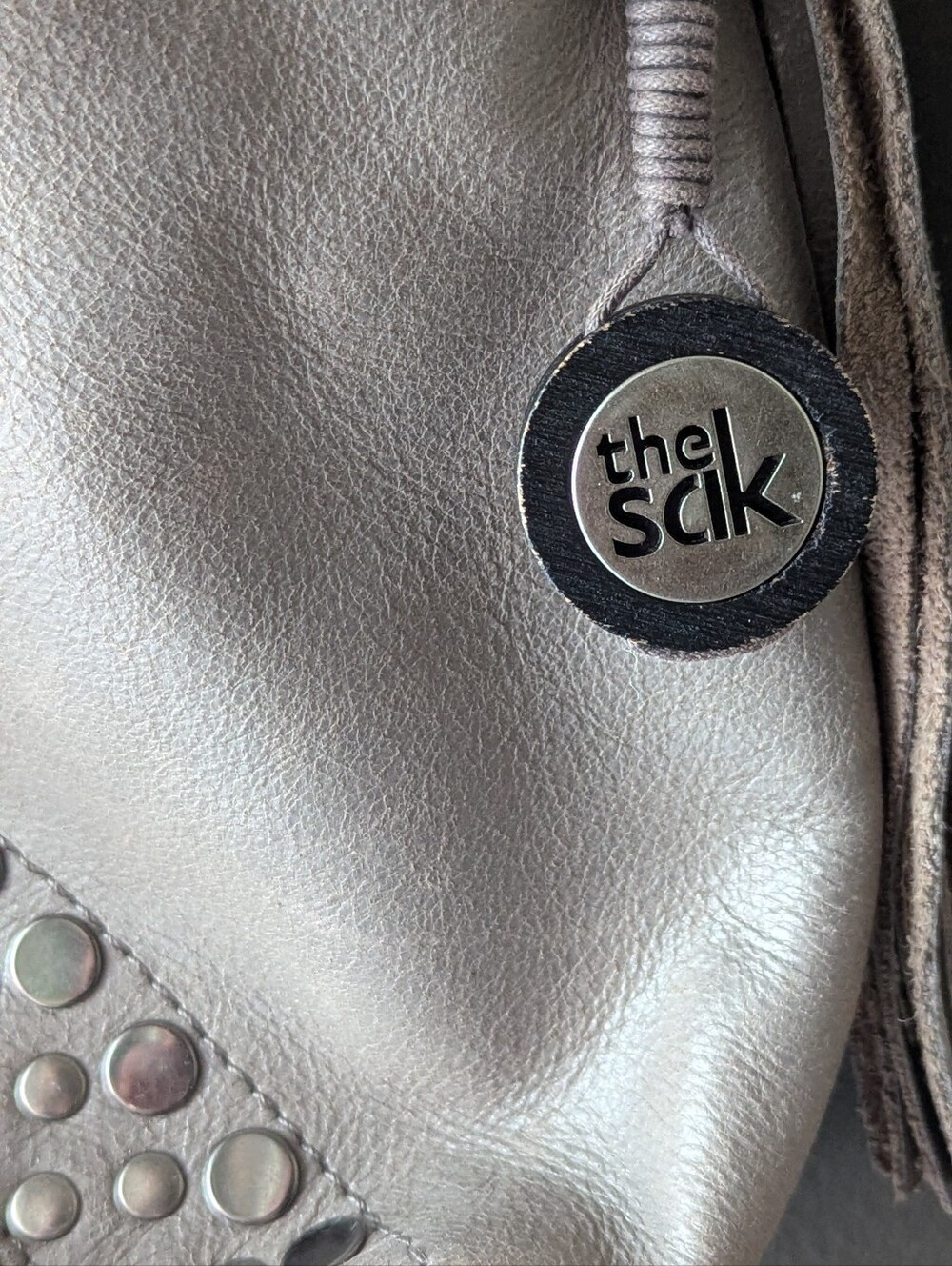 The Sak Gray Studded Shoulder Bag Small Zip Closure Silver Hardware Bag Charm